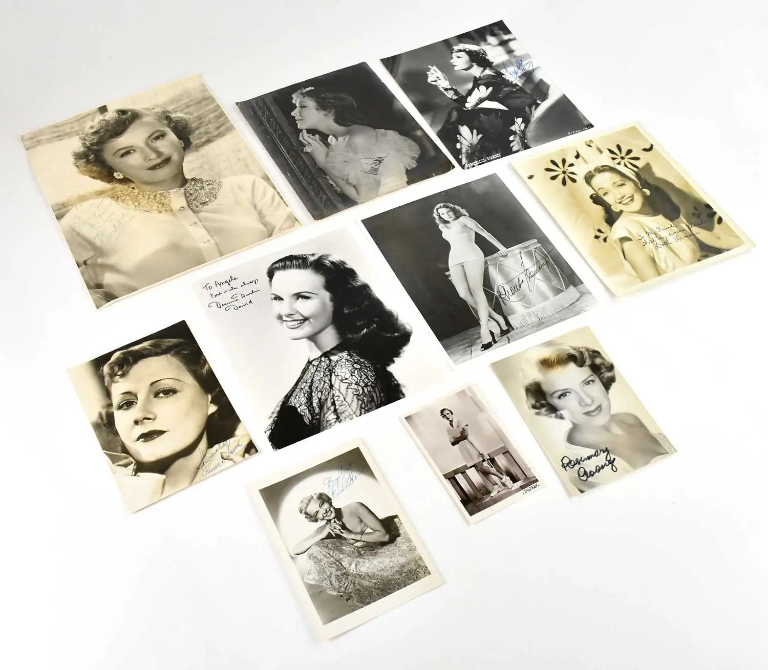 AMERICAN FILMS; a collection of fourteen mostly vintage signed b&w photos
