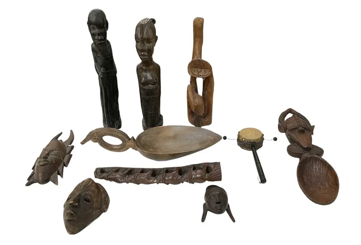 A quantity of assorted African carved wooden tribal figures and bowls