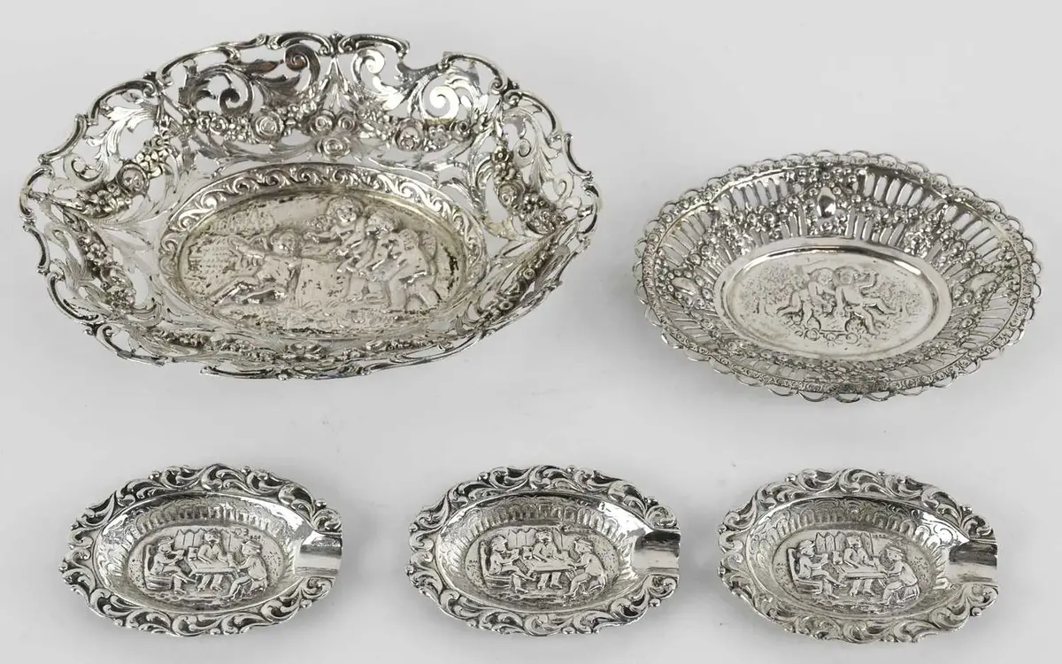 Two late 19th/early 20th century oval Continental white metal pierced dishes