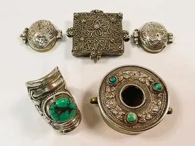 A Tibetan Ghau white metal amulet box