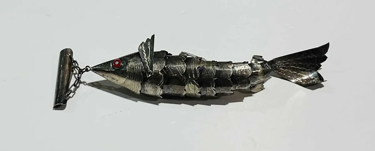 A Peruvian white metal fish