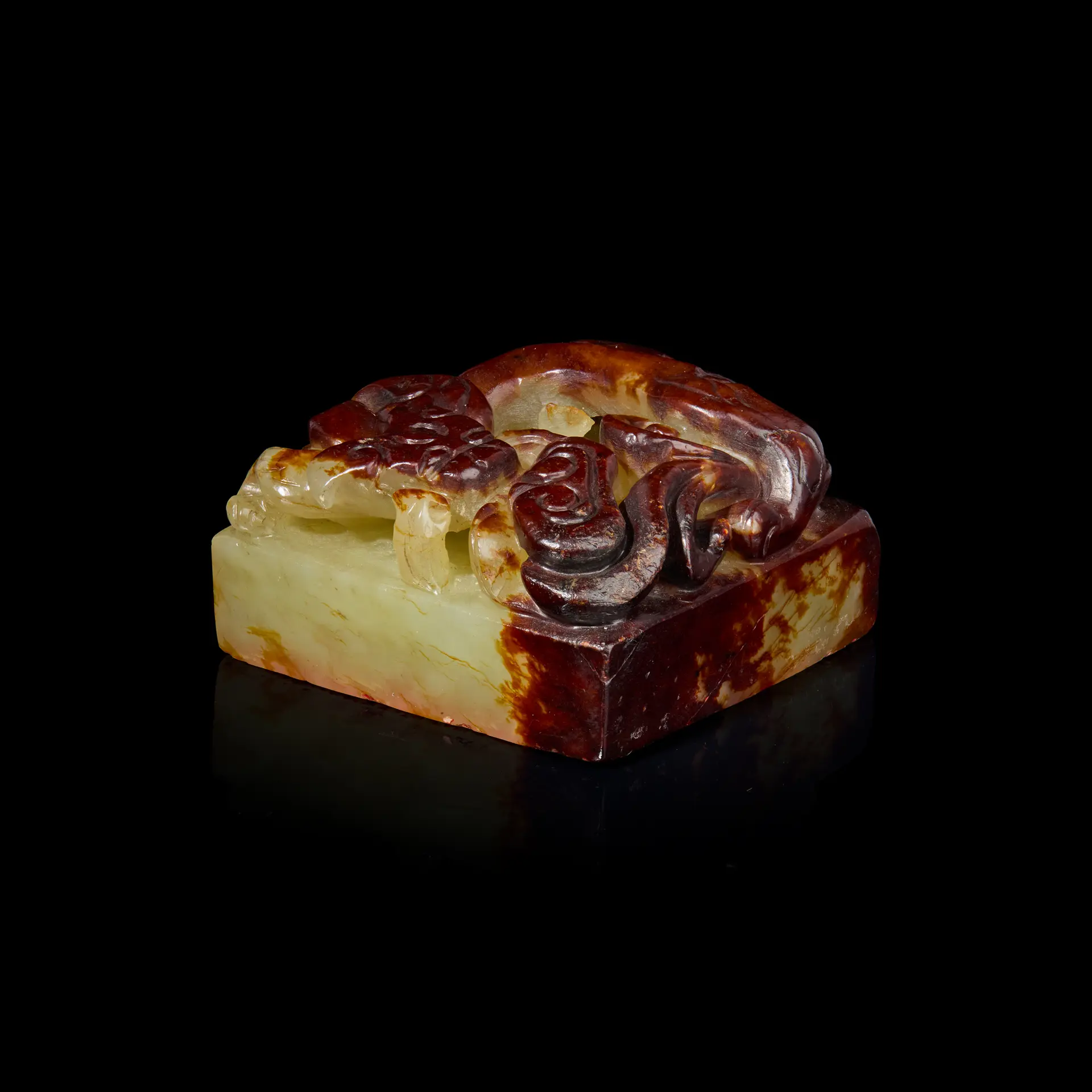 CHINESE WHITE JADE WITH RUSSET INCLUSIONS 'DRAGON' SQUARE SEAL