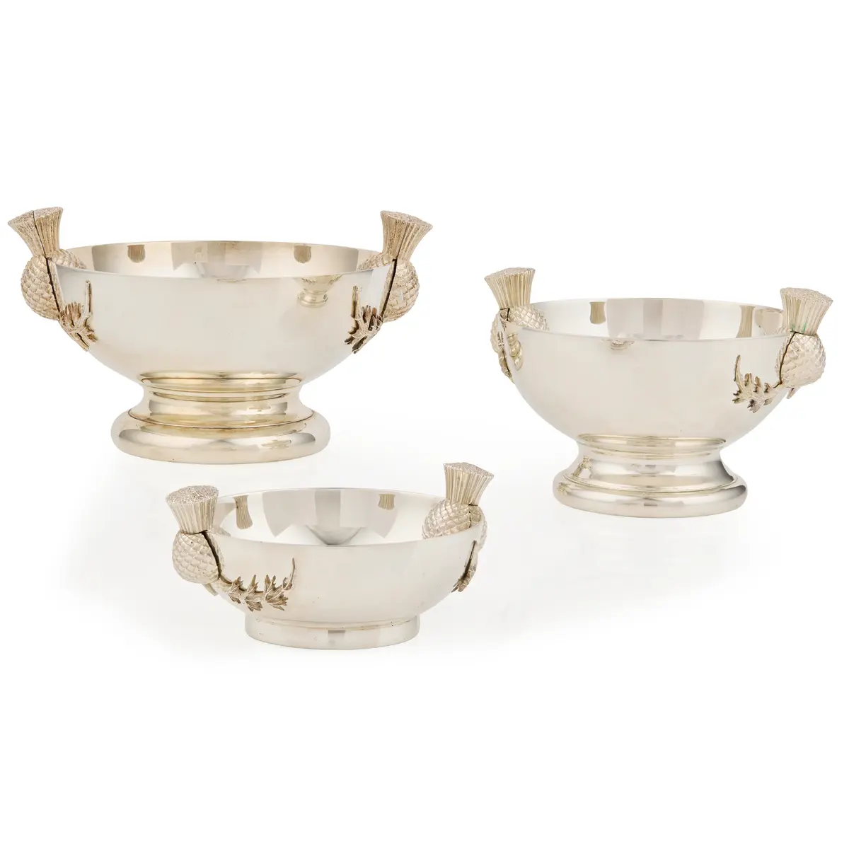 MATCHED SET OF THREE CONTEMPORARY SILVER GRADUATED THISTLE QUAICHS