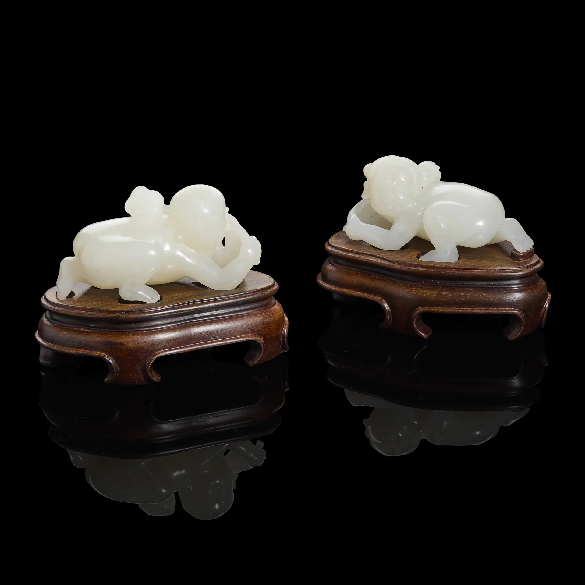 TWO CHINESE WHITE JADE CARVINGS OF HEHE TWINS