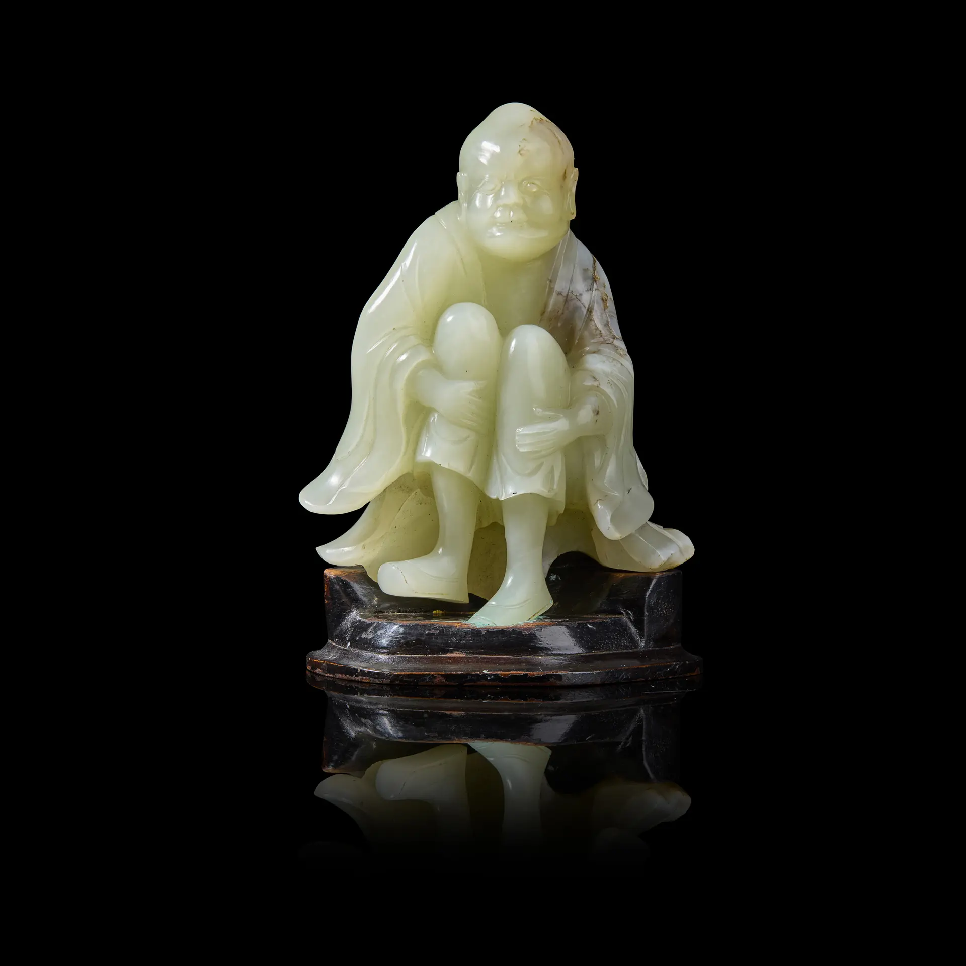 CHINESE WHITE JADE WITH RUSSET INCLUSIONS CARVING OF ARHAT
