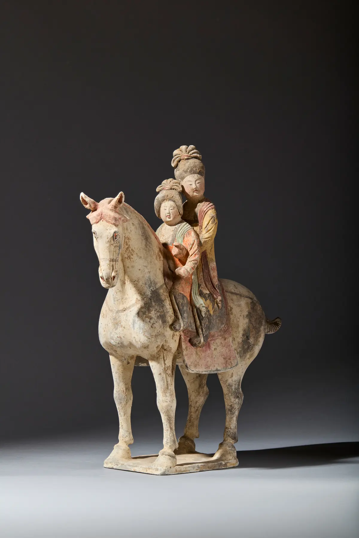 CHINESE PAINTED POTTERY HORSE WITH MOTHER AND DAUGHTER