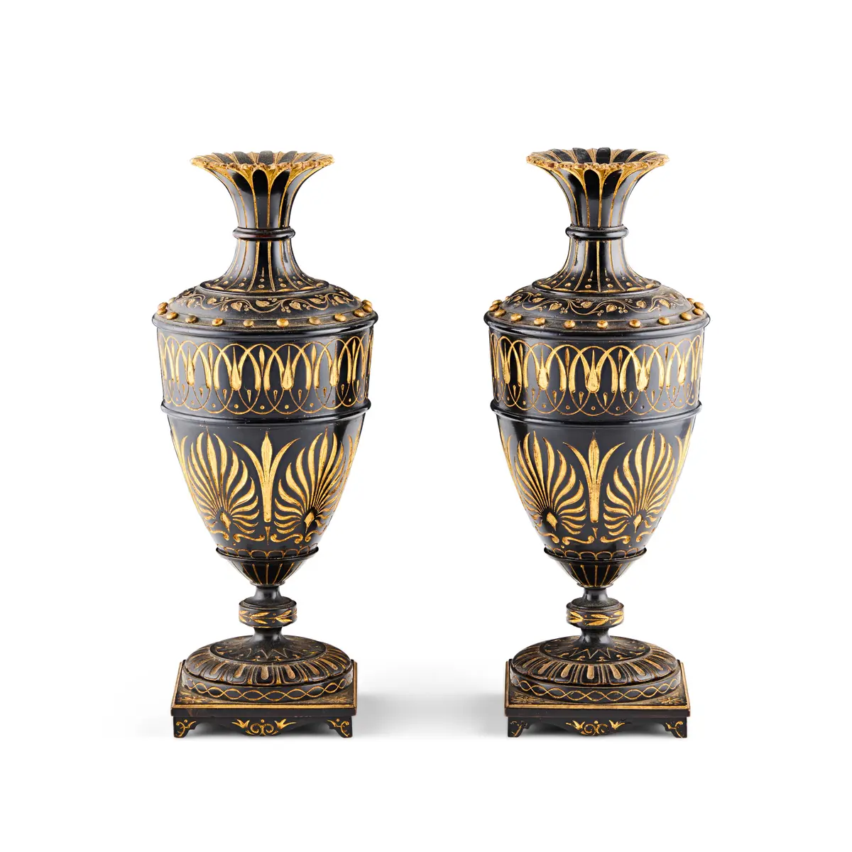 PAIR OF CARVED AND EBONISED GILT-DECORATED VASES, IN THE MANNER OF THOMAS HOPE
