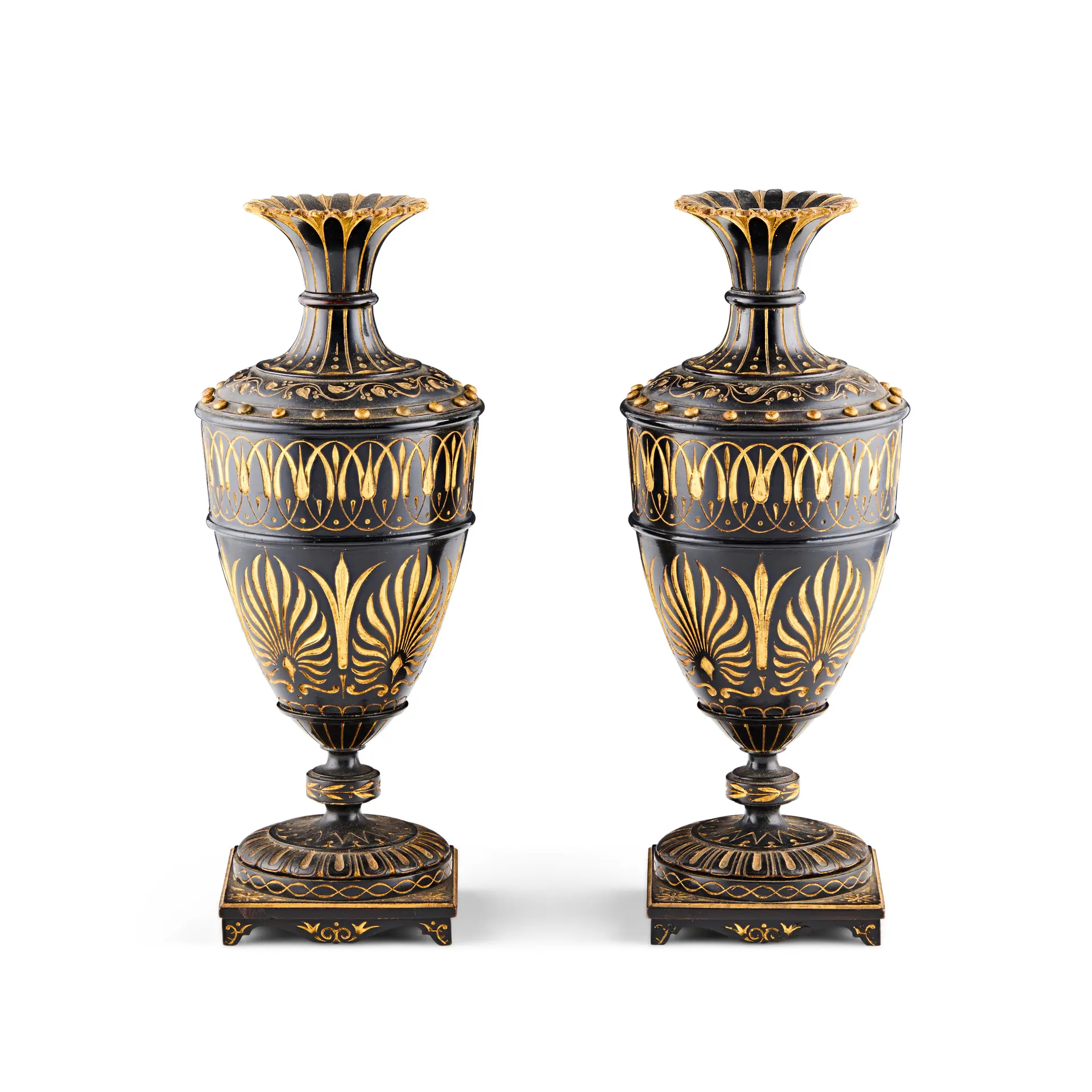 PAIR OF CARVED AND EBONISED GILT-DECORATED VASES, IN THE MANNER OF THOMAS HOPE