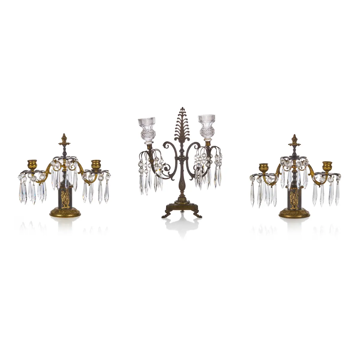 THREE REGENCY BRASS AND CUT GLASS CANDELABRA