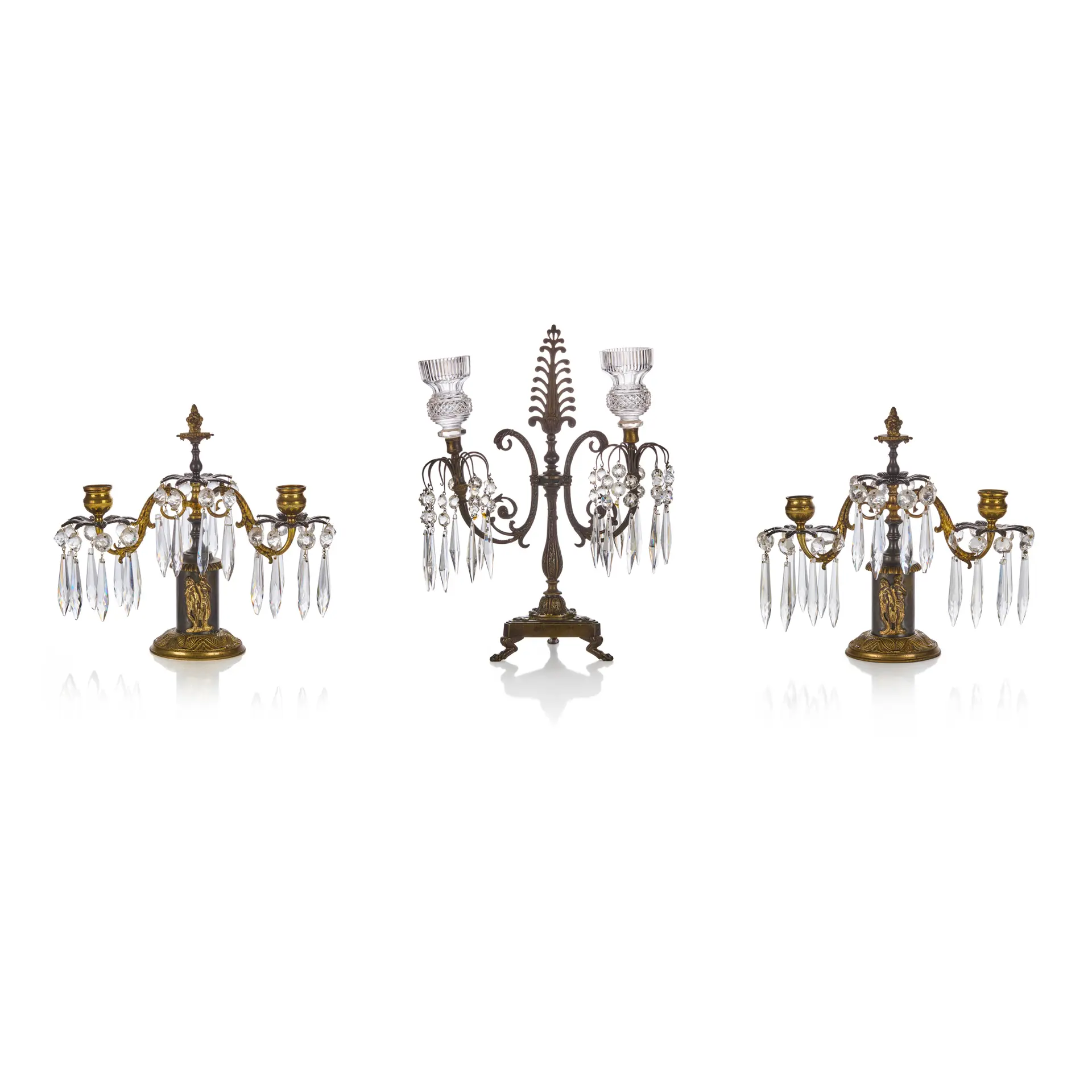 THREE REGENCY BRASS AND CUT GLASS CANDELABRA