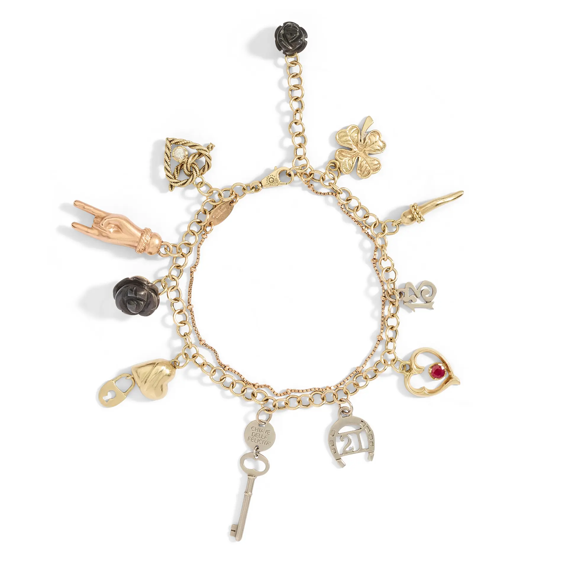 Dolce & Gabbana: An 18ct gold charm bracelet
