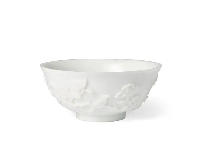 A Chinese carved white Peking glass bowl Qing dynasty