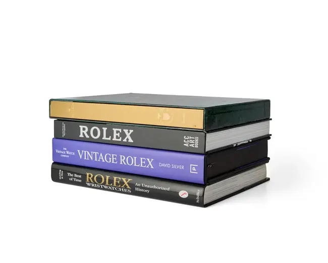 A group of four Rolex books