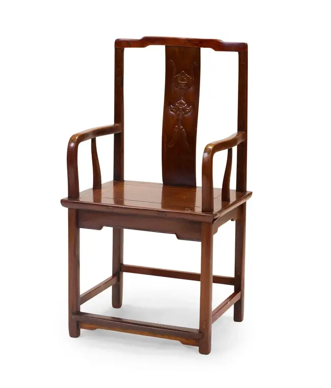 A Chinese hardwood armchair Late Qing dynasty The curved...