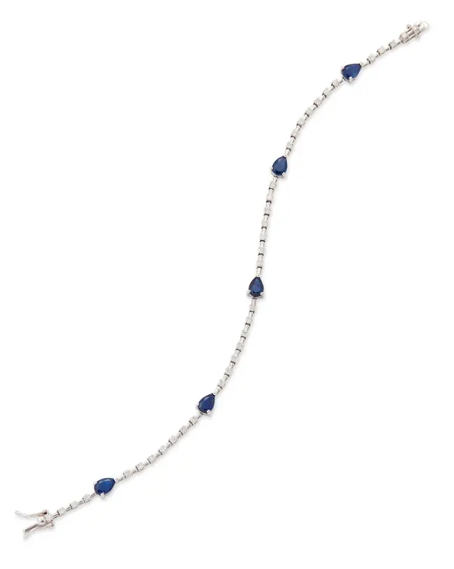 A 9ct white gold sapphire and diamond bracelet