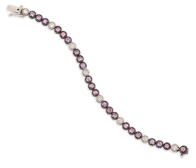 A diamond and pink sapphire line bracelet