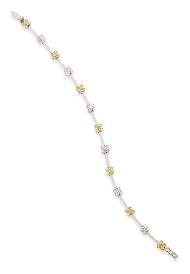 A diamond and coloured diamond bracelet