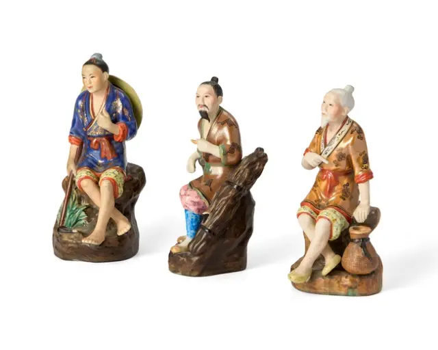 Three Chinese famille rose and enamelled figures of...