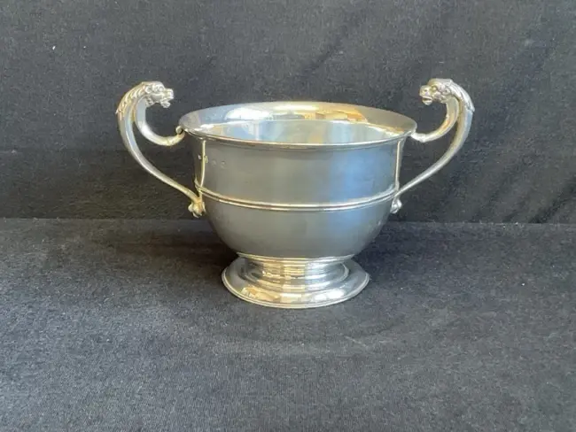 An Edinburgh hallmarked silver trophy cup style bowl with scrolled