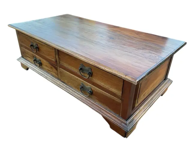 A contemporary hardwood coffee table with moulded rectangular top