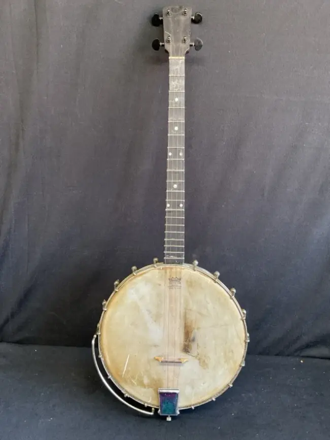 A 1920s four-string banjo with an American Remo skin, chrome mounts