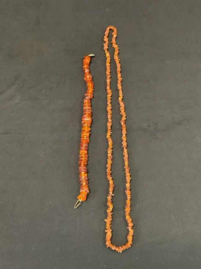 A 16in cognac amber choker necklace with irregular beads interspersed