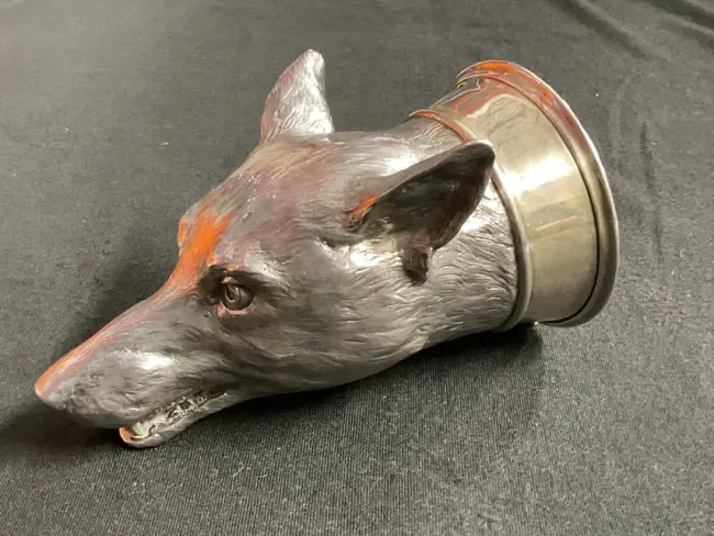 A hallmarked silver fox stirrup cup, dated 1959 and by Asprey & Co