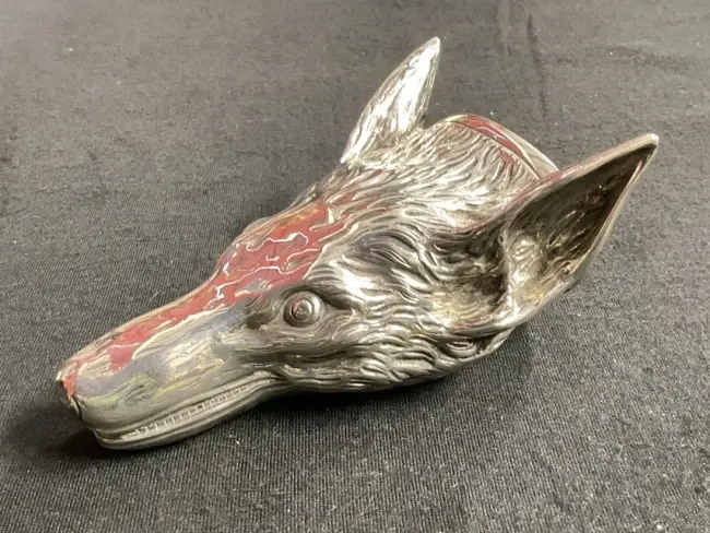 A hallmarked cast silver fox stirrup cup dated 1936 by CJ Vander Ltd