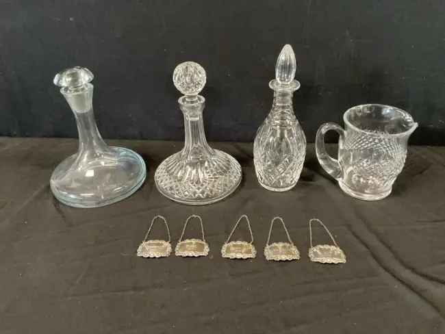 Three cut glass decanters & stoppers - Waterford, ships style and