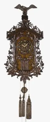 A large late 19th century oak Black Forest two tune hanging trumpeter