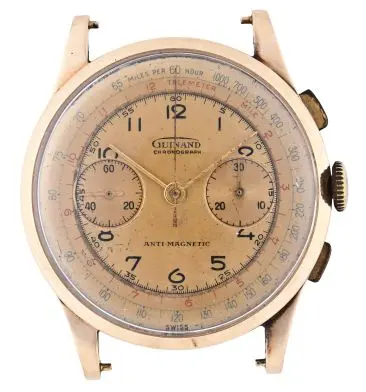A large mid 20th century gold wrist chronograph by Guinand