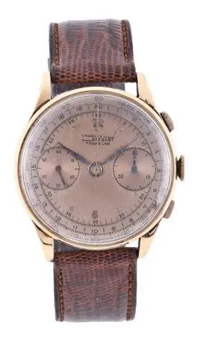 A large mid 20th century gold wrist chronograph by Nicolet