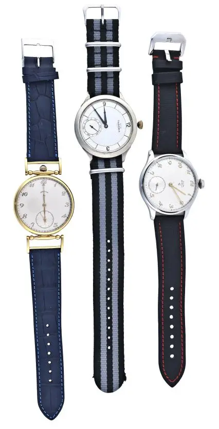 A lot of three pocket watch movements recased as wrist watches