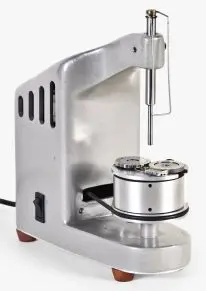 A clockmaker's Rollimat pivot polisher