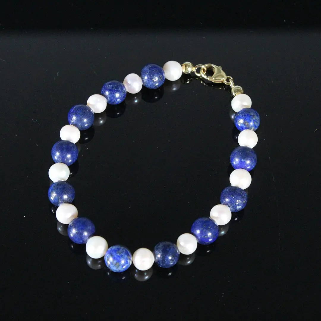 Armband mit SWZP und Lapis Lazuli, 375er Gelbgold.