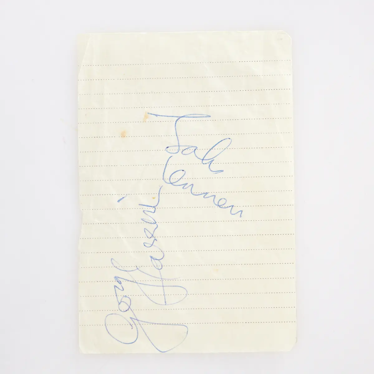 JOHN LENNON & GEORGE HARRISON. Signaturer, 1965, i bläck på linjerat papper.