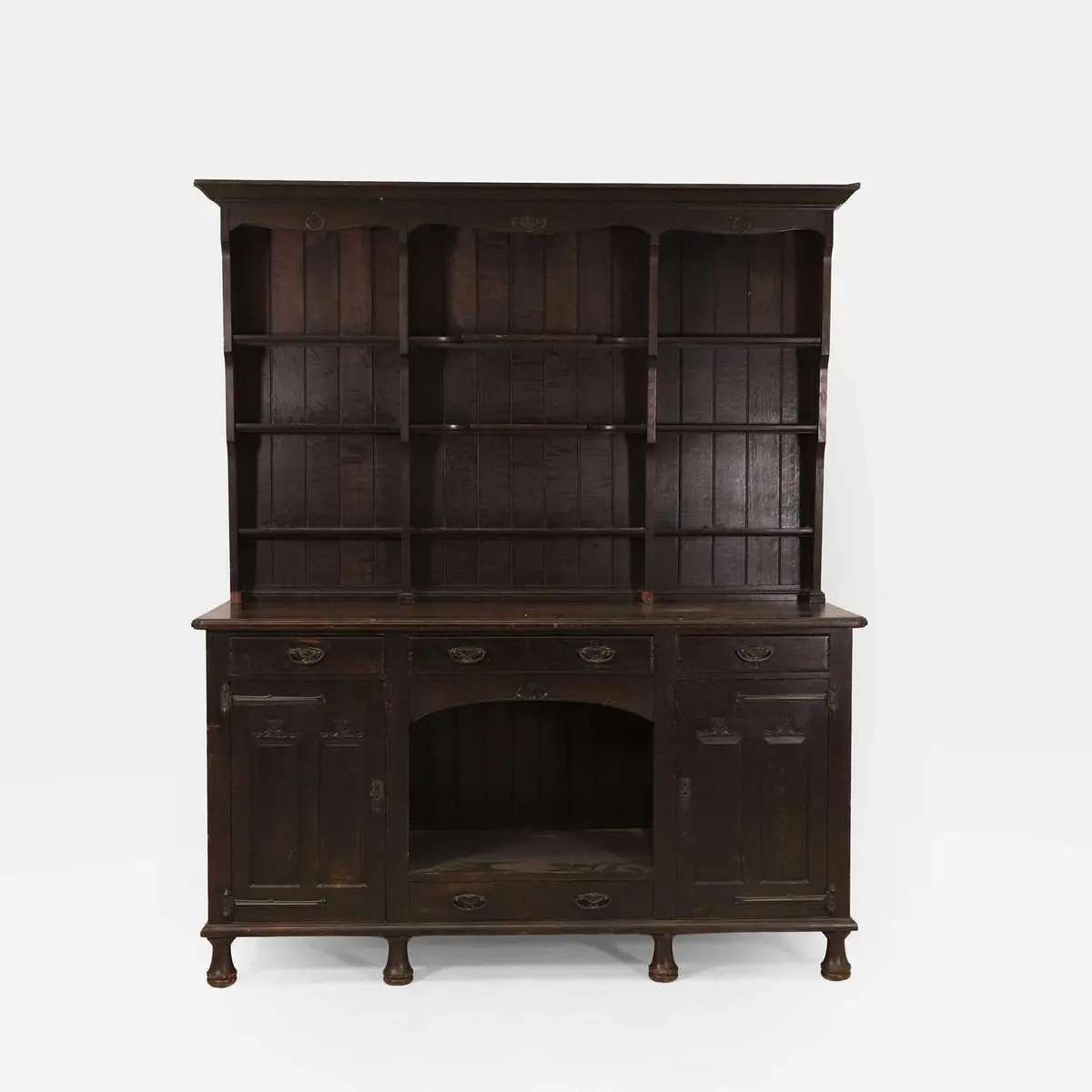 WAS Benson (British, 1854-1924) for Morris & Co. a large oak dresser