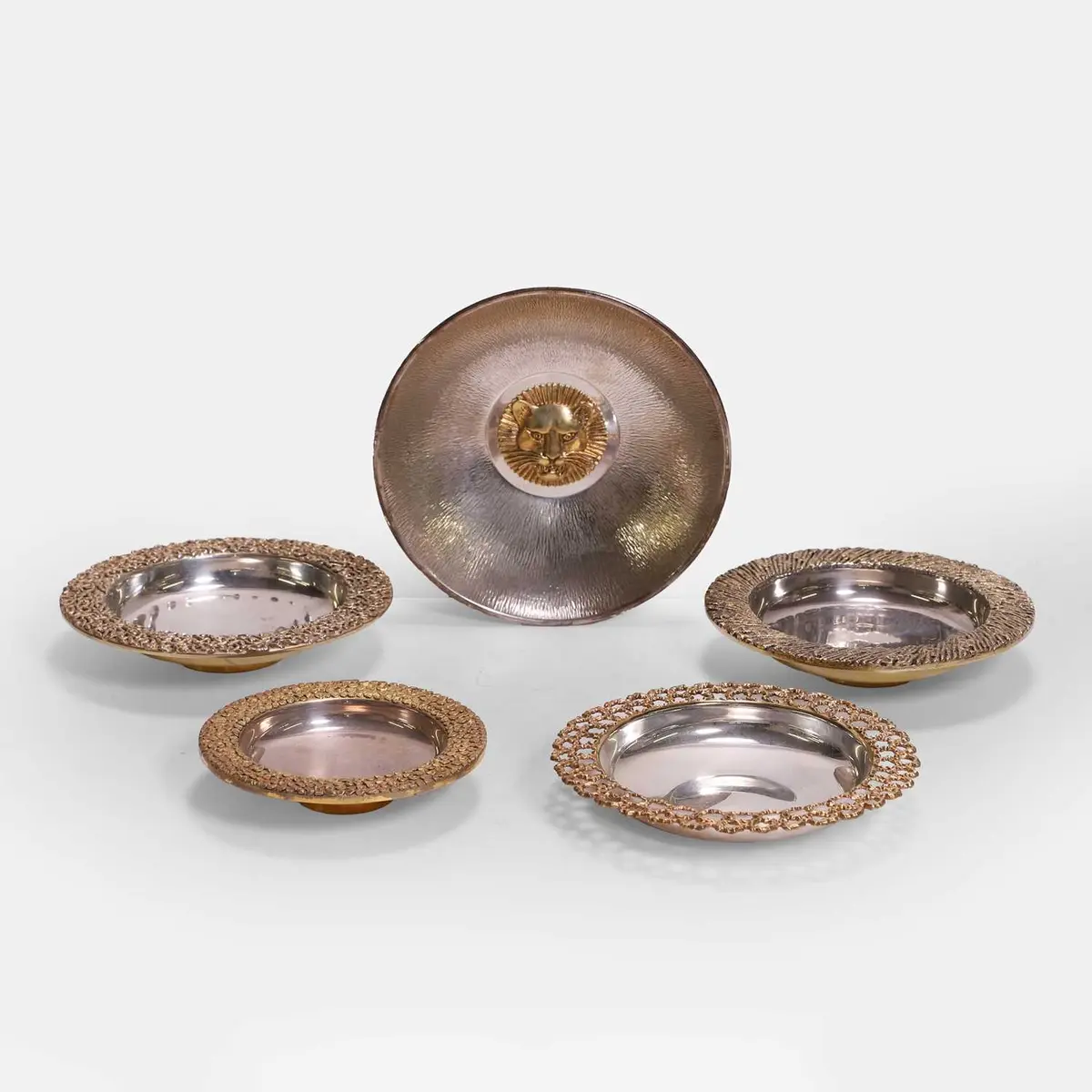 Stuart Devlin (Australian-British, 1931-2018) five silver and silver-gilt