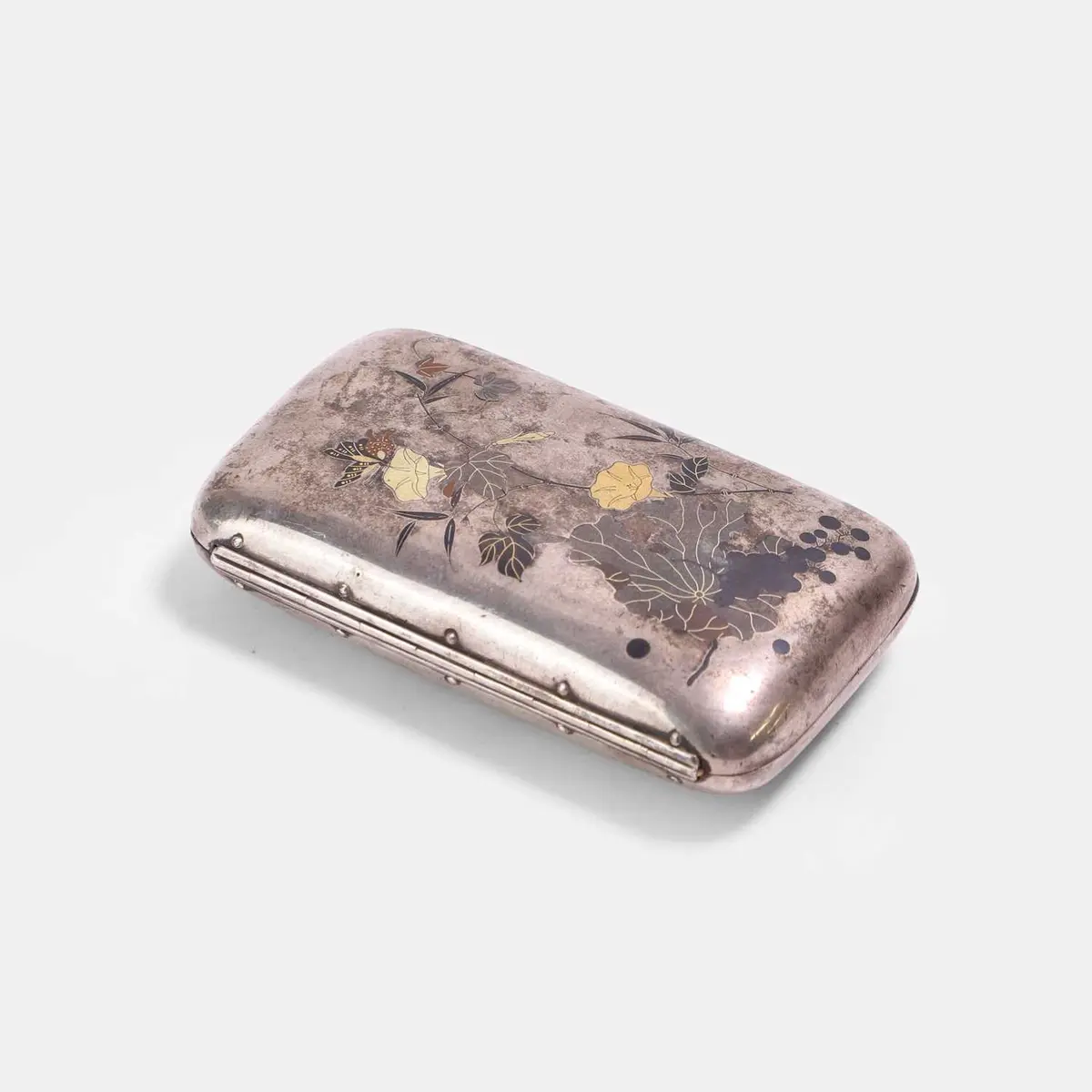 A Japanese mixed-metal inlaid silver cigarette case Meiji period (1868-1912)