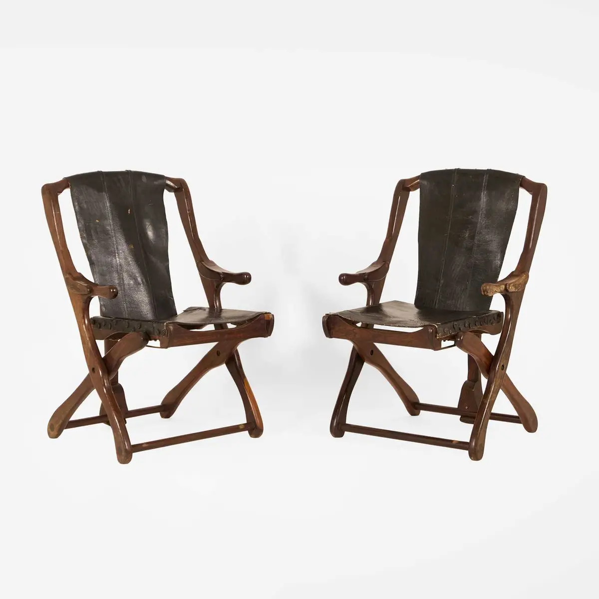 Don Shoemaker (American, 1919-1990) a pair of 'Sling' armchairs