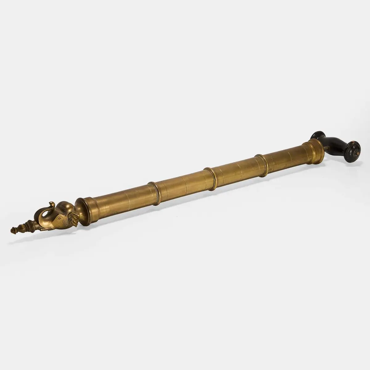A brass Holi syringe 'abir ki pichkari' late 19th/early 20th century