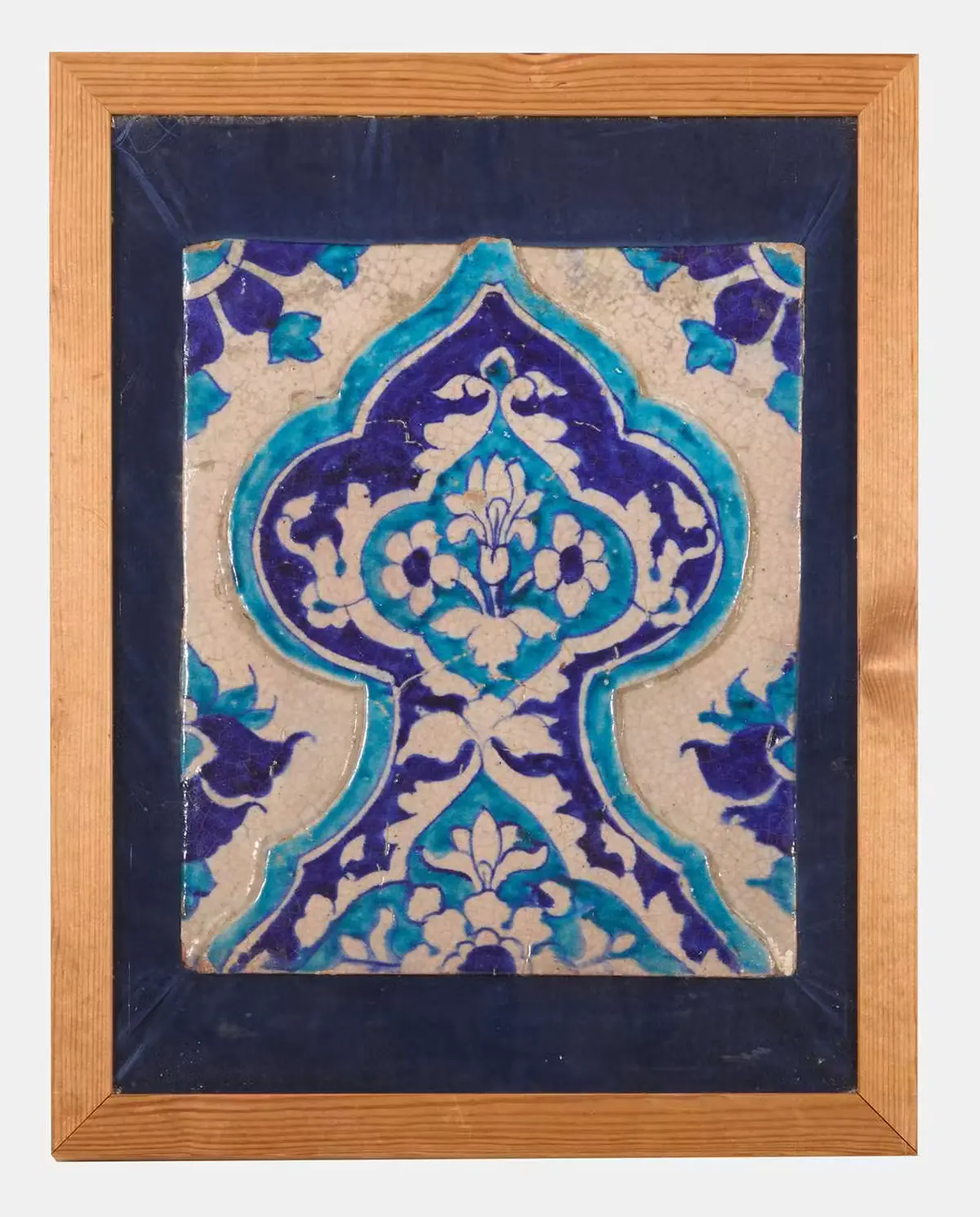 A Multan moulded cobalt-blue and turquoise glazed tile panel 19th