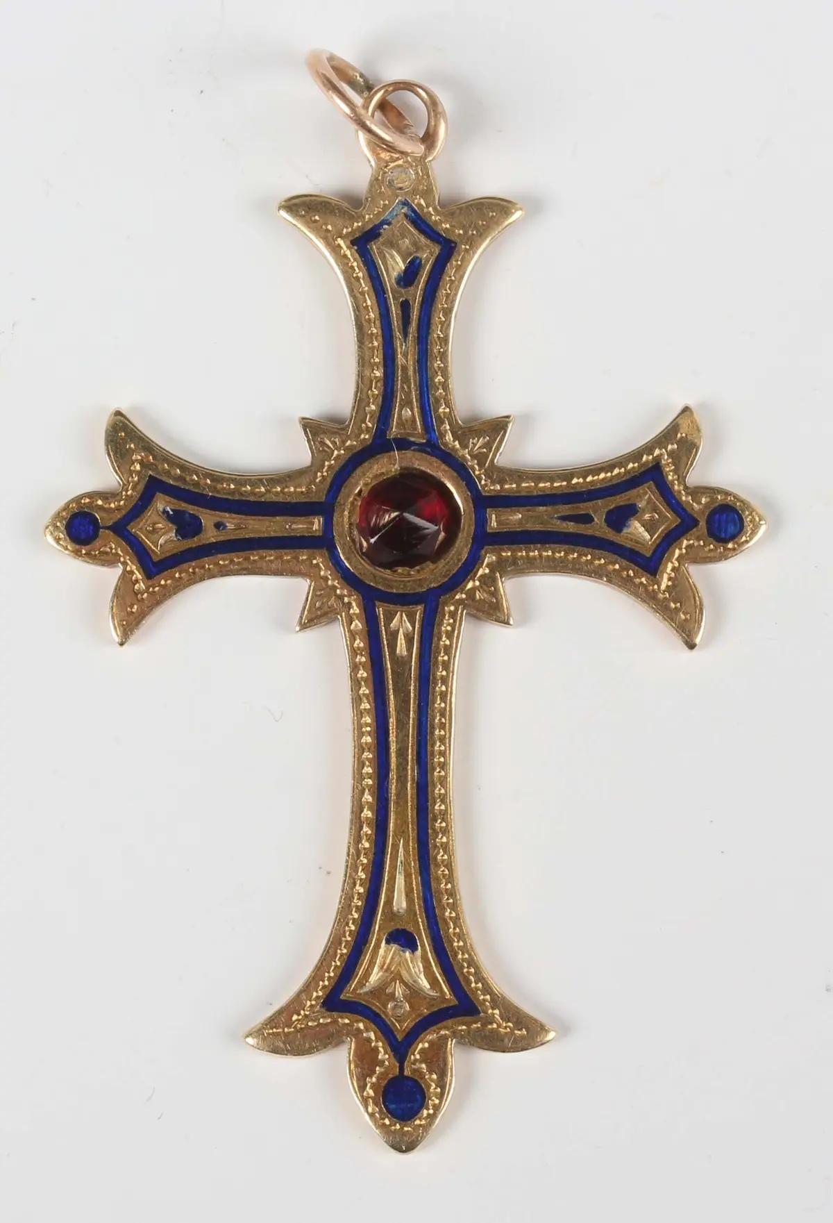A gold, blue enamelled and garnet set pendant cross, the suspension