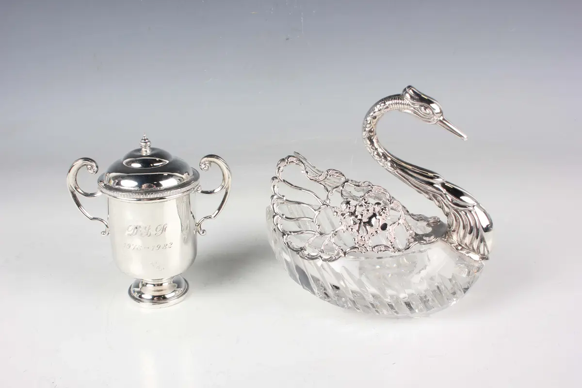 An Elizabeth II silver mounted cut glass potpourri jar in the form
