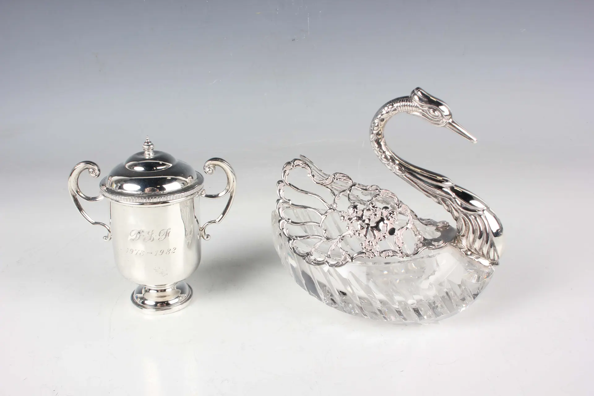 An Elizabeth II silver mounted cut glass potpourri jar in the form