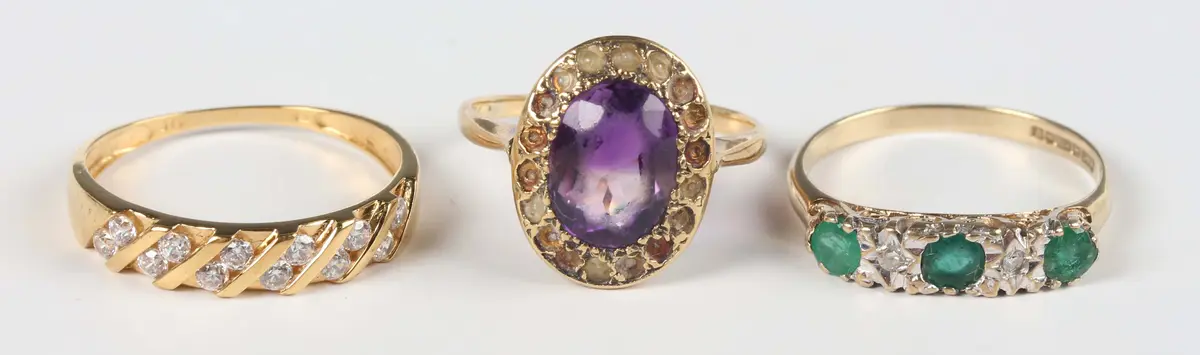A 9ct gold, emerald and diamond five stone ring, ring size approx