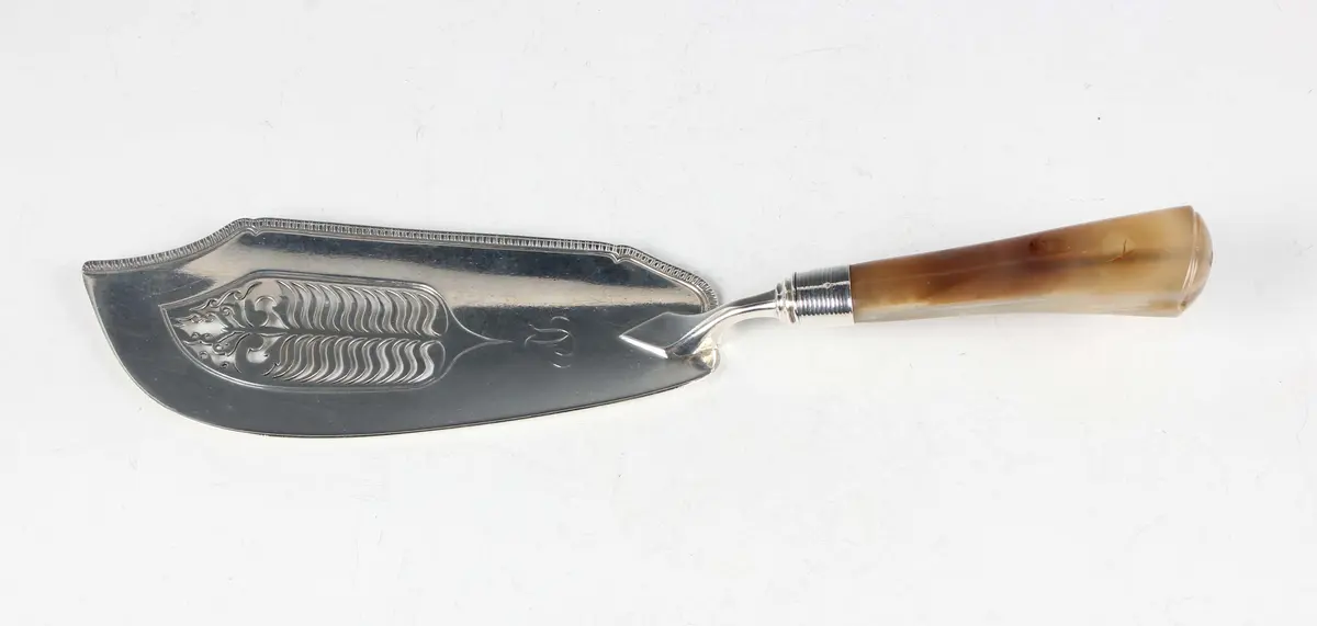 A George III silver fish slice with pierced blade and agate handle