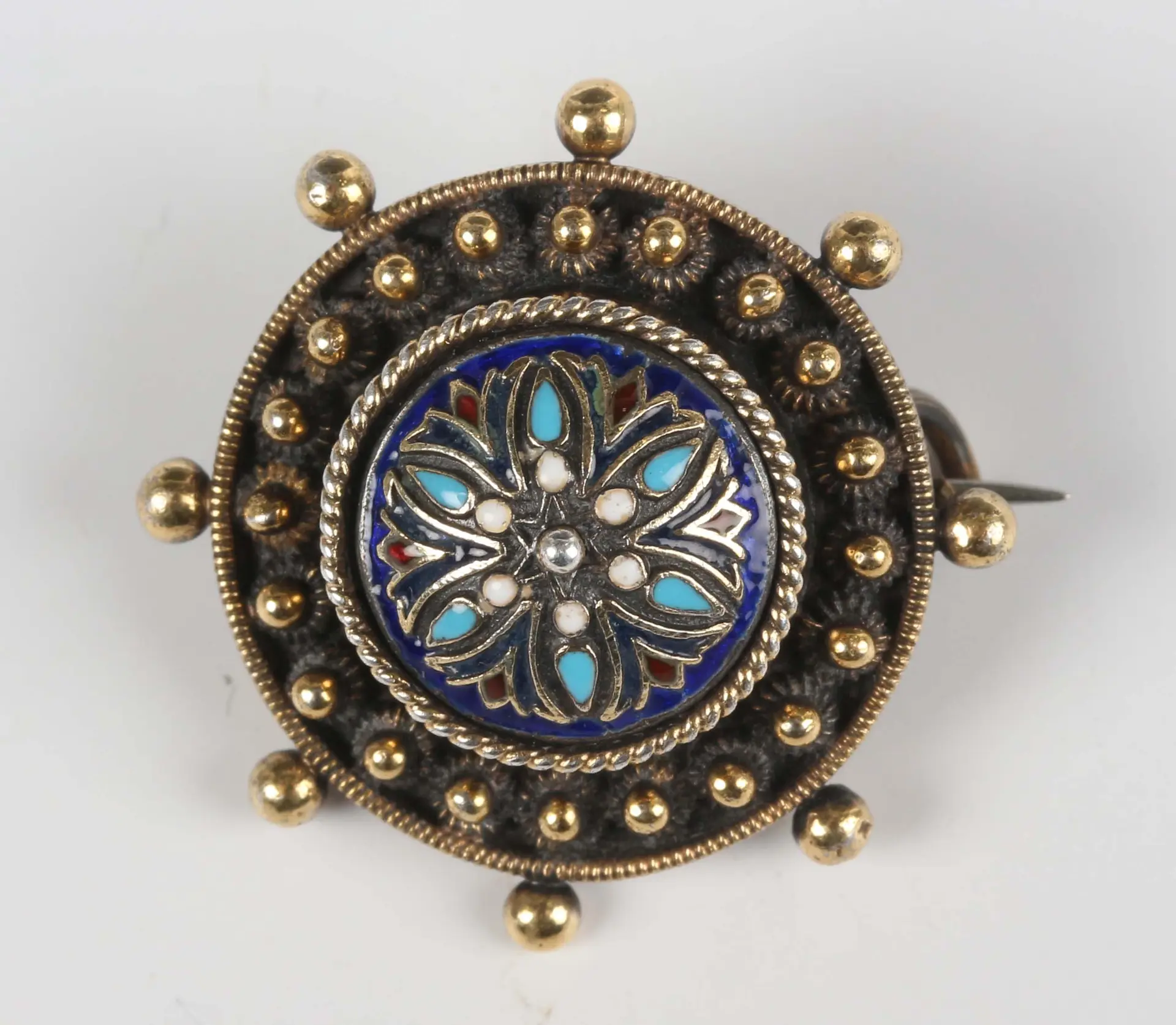 A Norwegian David Andersen .830 silver and polychrome enamelled circular