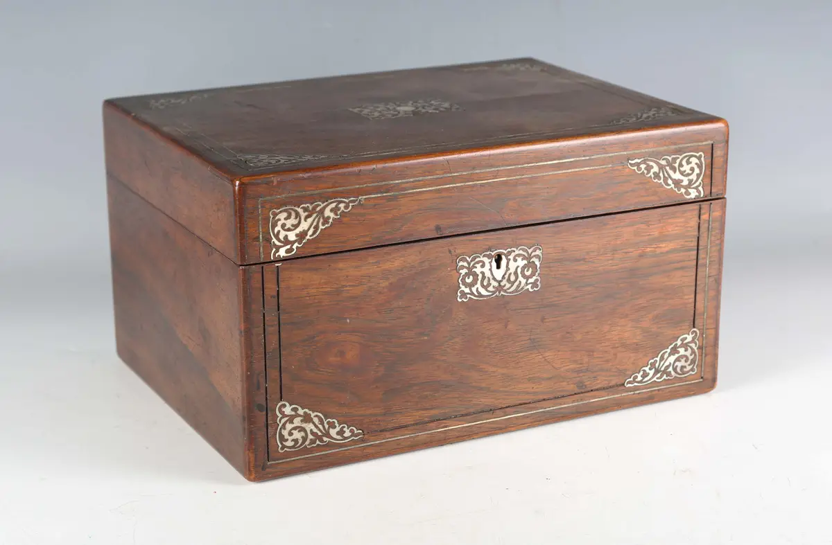 A Victorian rosewood and mother-of-pearl inlaid vanity case, the interior
