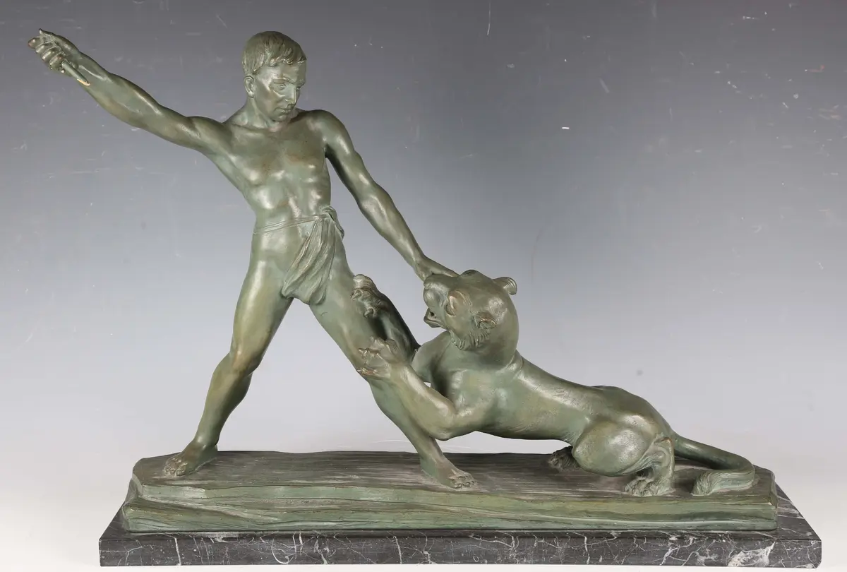 Auguste Henri Carli - an Art Deco green patinated plaster figure of